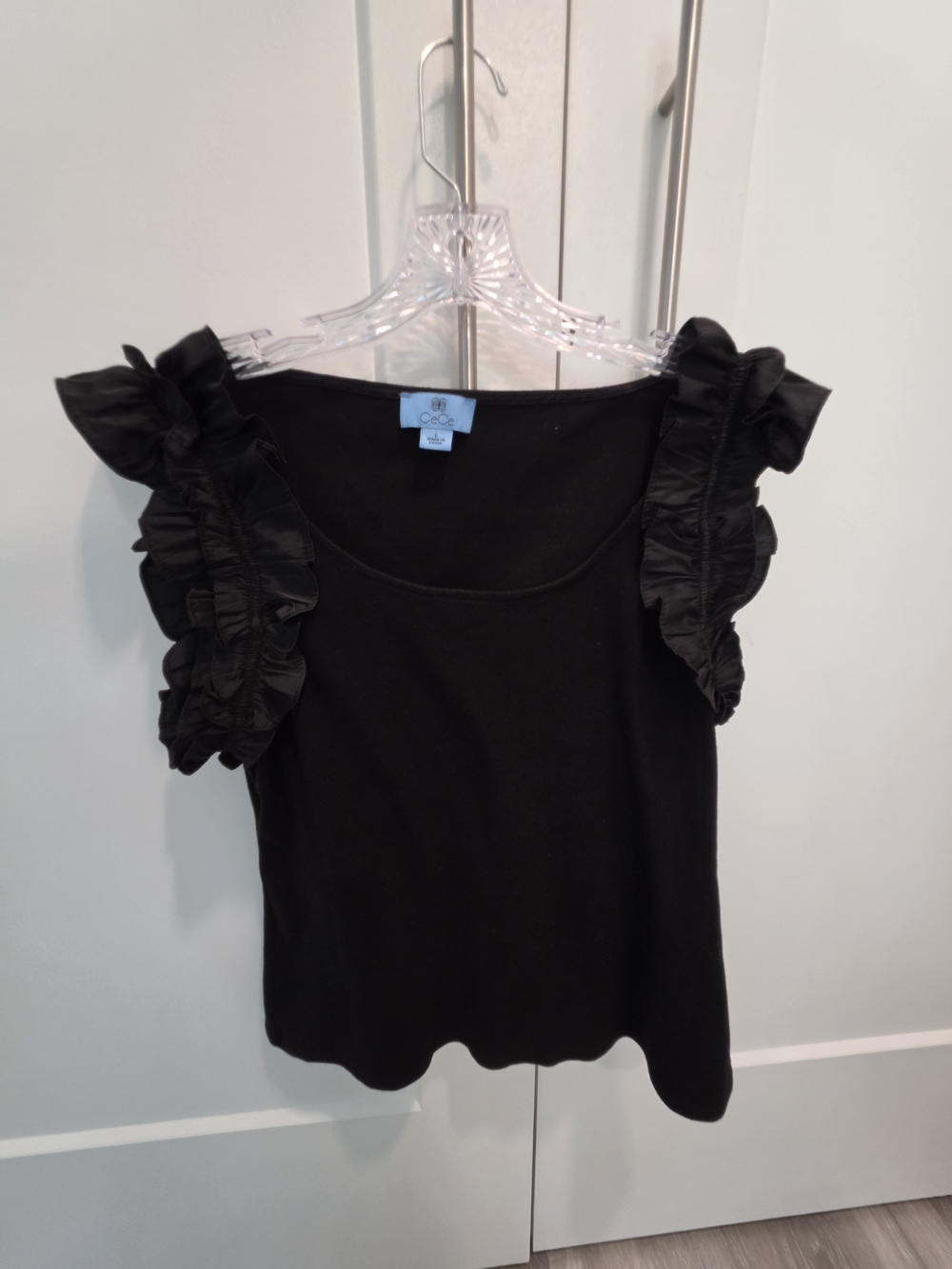 CeCe 3 Tops- Black, White And Orange Ruffle Sleeve Tank Tops.